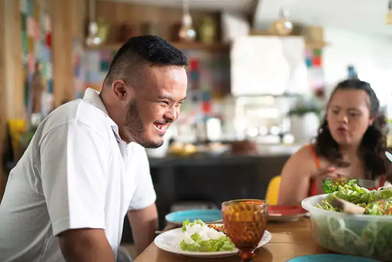 Empowering Weight Loss: A Comprehensive Guide for Individuals with Disabilities 2 Image of a disabled man and balance around nutrition to aid weight loss Braintree