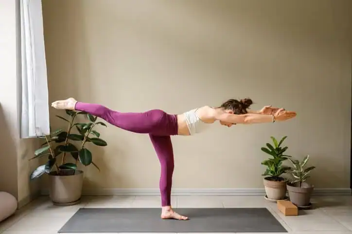 Woman doing Yoga exercise Braintree to help with toning the body. 