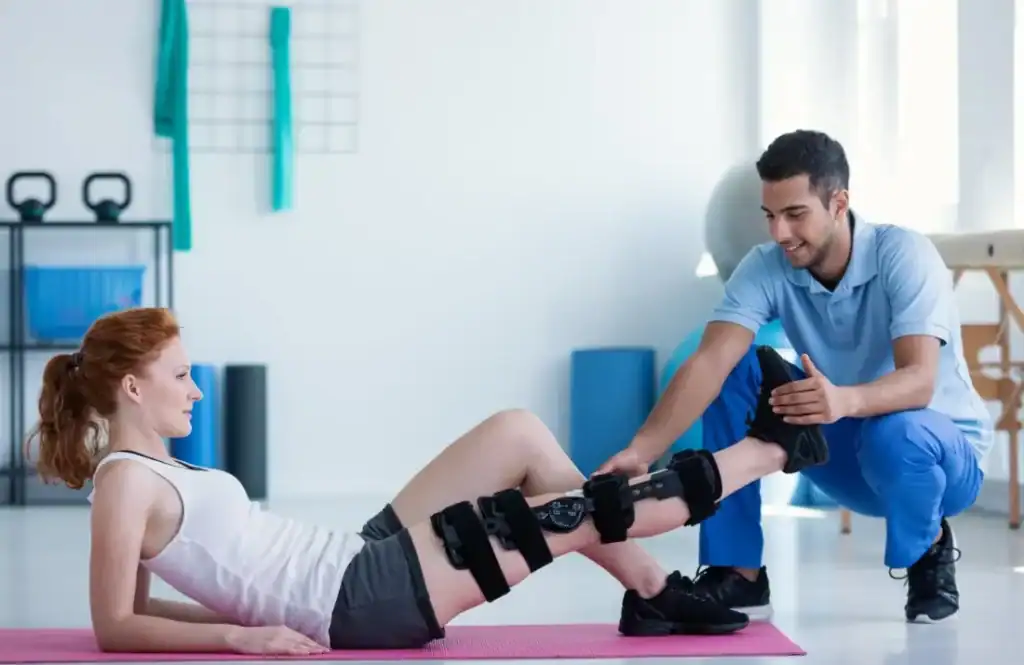 Woman having treatment to help muscle recovery Braintree after an injury